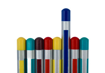 Eight color pencil of different color placed in a row in front of a white background