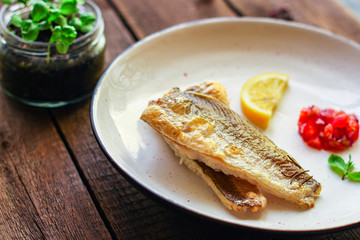 Fried fish fillet hake, seafood main course pescatarian
Menu concept. food background. top view copy space for text keto or paleo diet