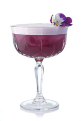 Purple alcohol cocktail in vintage glass isolated on white