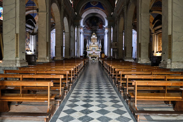 Fototapeta premium Church Pieve of Capannori, Solo Backpacker Trekking on the Via Francigena from Lucca to Siena. Walking between nature, history, churches,