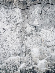 Gray stone old cracked wall abstract texture for graphic design (mobile photography)