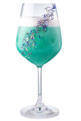 Turquoise alcohol cocktail in vintage glass isolated on white