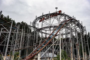 Deurstickers Abandoned city amusement park. Roller Coaster. © Vladimir