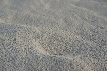 Waves in sand on beach