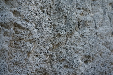 Obraz na płótnie Canvas Textured close-up of volcanic rock
