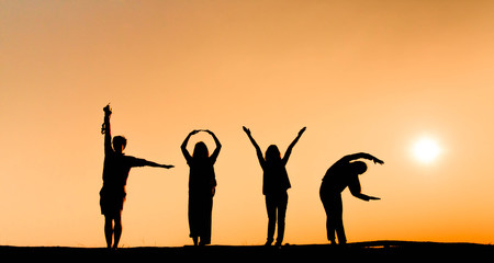 silhouette of love by four people body action.