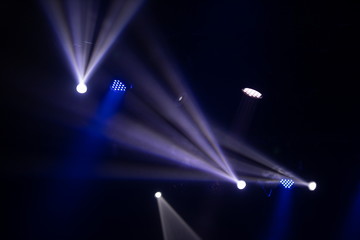 scene, stage light with colored spotlights and smoke