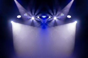 scene, stage light with colored spotlights and smoke