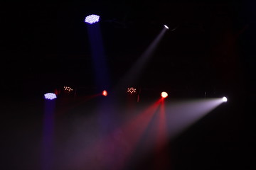 scene, stage light with colored spotlights and smoke