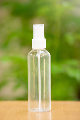 Plastic blank bottle on wooden table.