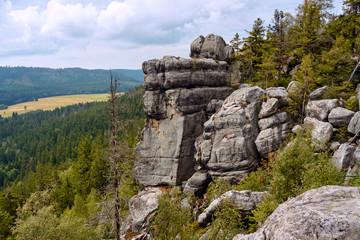 Rock formations seen from Rock Labyrinth hiking trail nearby Szczeliniec Wielki peak in Table Mountains, Poland