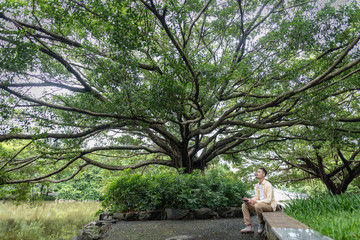 young traveller man in garden of China