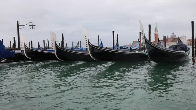 Bow of the gondolas the typical boats for tourists in Venice Italy