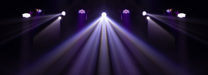Theater lights spotlights over the stage, texture background for design.