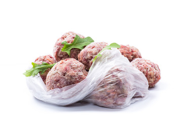 frozen raw meatballs from beef and pork with carrots and rice