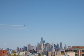 Fototapeta premium Brooklyn, New York / USA - 04-28-2020 The blue angels and the thunderbirds fly over NYC as a demonstration to the first responders 