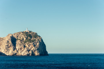 Fototapeta na wymiar Formentor lighthouse seen from the high seas