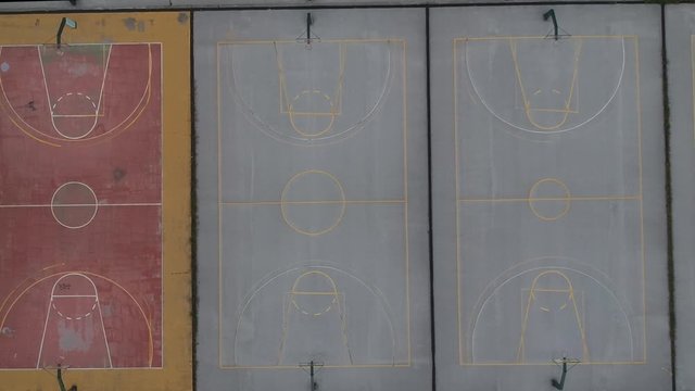 Aerial drone shot over basketball courts in a sports complex in Poseidonio, Thessaloniki Greece