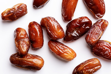 Royal, big dates on a white background, close-up, flat lay.