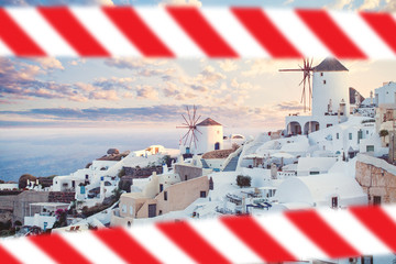 Beautiful Santorini landscape, Greece with warning tape. Covid-19 quarantine