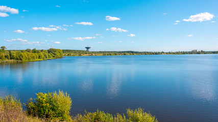 Landscape withe river and satellite communication antenna