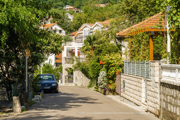 Fototapeta na wymiar Sunny view of beautiful village Orahovac on Kotor Bay, Montenegro.