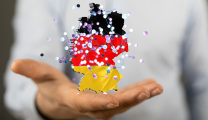 Abstract of germany map network in hand