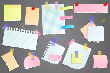 Collection of torn blank scraps of paper for memos, attached to a grey notice board with tape or thumb tacks in different colors and sizes with copy space.