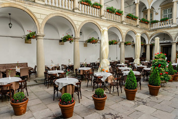 Fototapeta na wymiar Italian courtyard in Lviv in the style of the Italian Renaissance on May 12, 2019 in Lviv, Ukraine