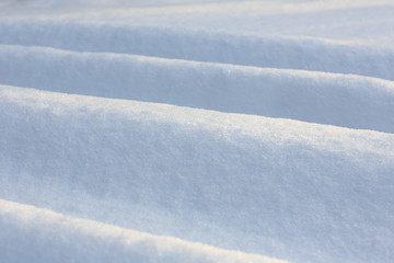 Fototapeta na wymiar Snow crust. Snowy texture. Gray background.