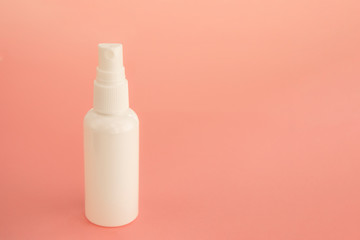 Sanitizing antibacterial spray in white bottle for infection prevention concept. Sanitizer to prevent