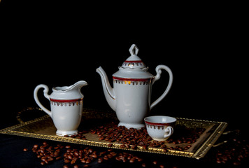 The image, aroma and flavor of coffee. Arrangement with coffee and accessories.