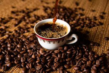 The image, aroma and flavor of coffee. Arrangement with coffee and accessories.