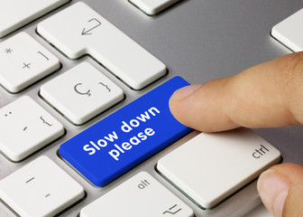 slow down please - Inscription on Blue Keyboard Key.
