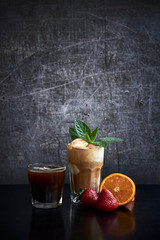 Glass of latte with vanila ice cream and glass of black coffee and fruits - obrazy, fototapety, plakaty