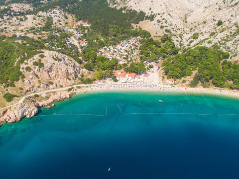 Aerial view of Mali raj naturist beach shore in Baska, Krk island, Croatia.
