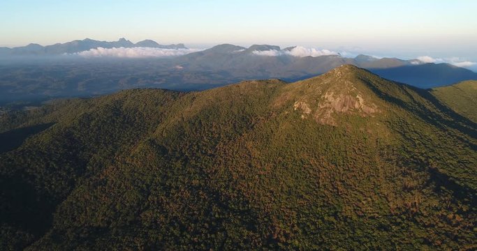 Drone shot of a mountain with the sunset light