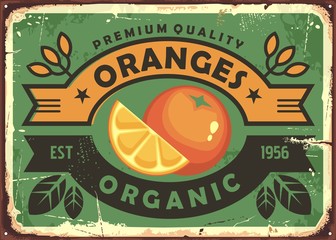 Oranges vintage sign. Organic fruit farm poster template with slice of orange, leaves and ribbons. Vector nostalgic banner.