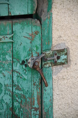 Green rusty horse stables doors