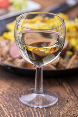 white wine and swabian pork filet with spaetzle on wood