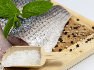 mullet fresh fish on a cutting board