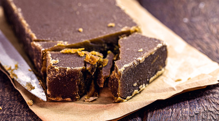 Sweet made from sugar cane, on a rustic wooden table, delicacy from Latin America, homemade desserts,