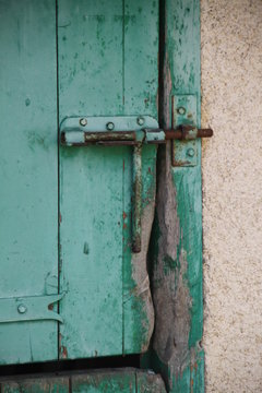 Green rusty horse stables doors