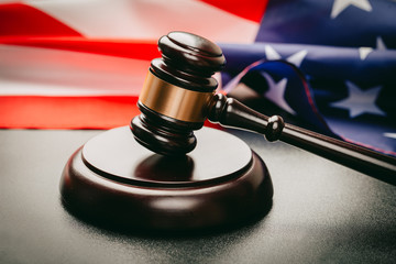 law gavel and USA america flag - American crime concept