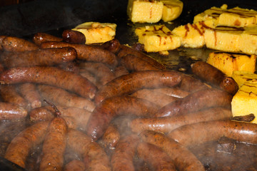 Unhealthy, greasy, oily, mix of meat slices, frying