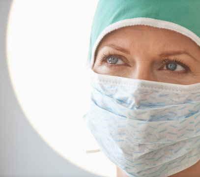 Female doctor with surgical mask
