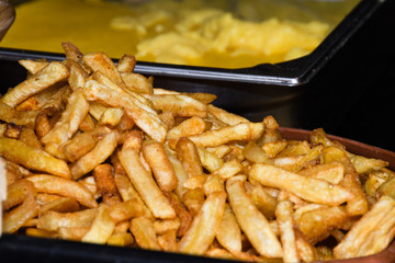 Baked potato wedges with cheese.