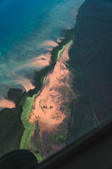 aerial view of basin draining into the ocean 