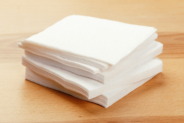 white paper napkin with a textured pattern on an old table