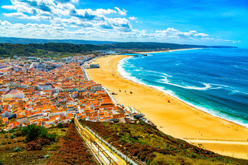 Nazare, Portugal: Panorama of the Nazare town and Atlantic Ocean seen from viewpoint on Nazare Sitio hill